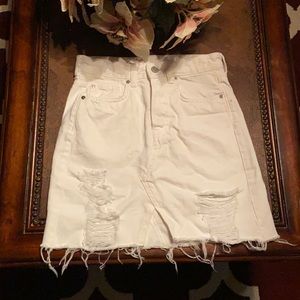 Hi, this is a fashionable denim white skirt only once worn.